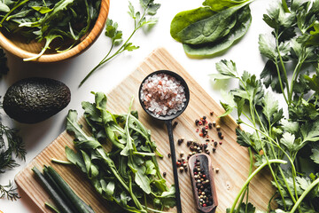 Green vegetables and fruits, avocado, lime, cabbage, parsley, cucumber, dill, onion ,salad, spinach