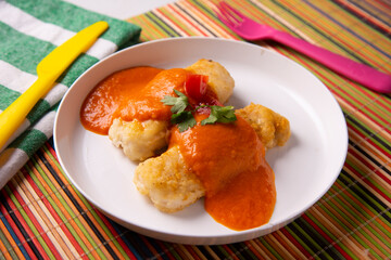 Fish filet with tomato sauce
