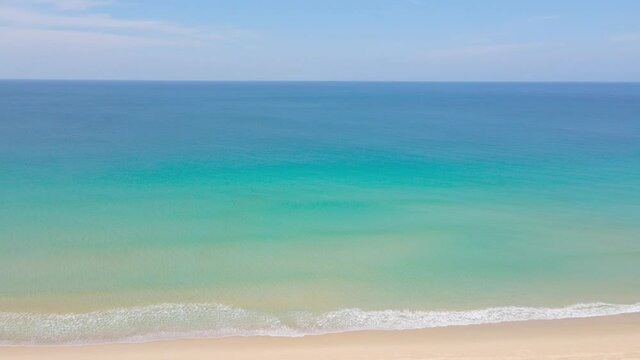 Aerial view high angle view. Scene of Top view beach sand and sea, White sand and blue sea water clear texture.