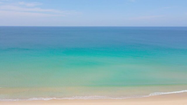 Aerial view high angle view. Scene of Top view beach sand and sea, White sand and blue sea water clear texture.