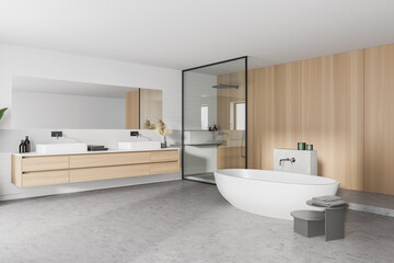 Interior of stylish bathroom with wooden walls, concrete floor, comfortable bathtub, double sink with horizontal mirror and shower stall. 3d rendering