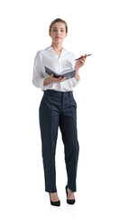 Attractive young woman is holding a notebook and pondering how to optimize business process to boost sales of the company. Full length business woman Isolated over white background