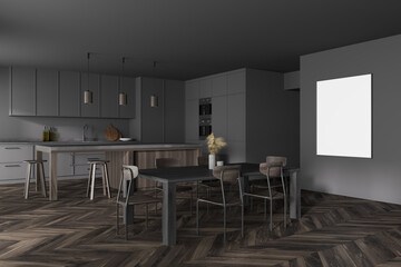 Modern kitchen interior with gray walls, a wooden parquet floor and gray countertops. A long table with chairs near it. mock up poster on wall. 3d rendering