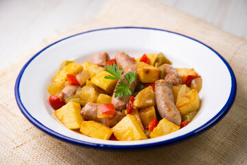 Salchichas stew with potatoes and paprika