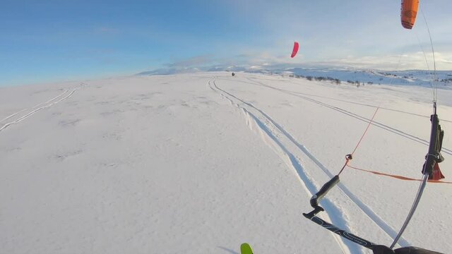 Snowkiting in Norway. Kiting at Storwartz, R&oslash;ros