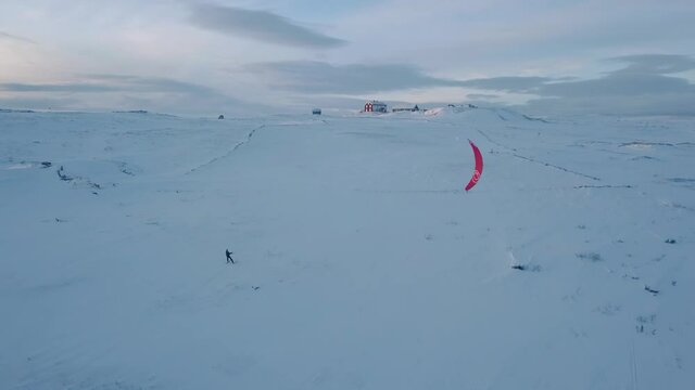 Snowkiting in Norway. Kiting at Storwartz, R&oslash;ros