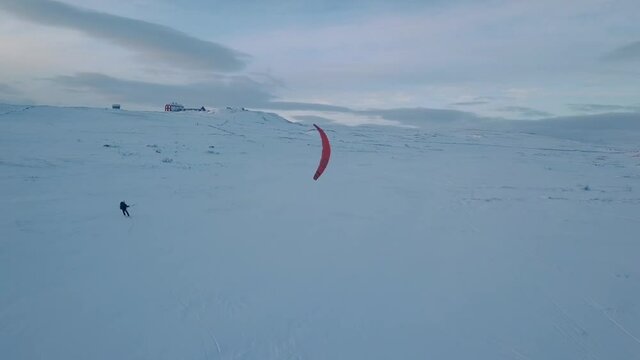 Snowkiting in Norway. Kiting at Storwartz, R&oslash;ros