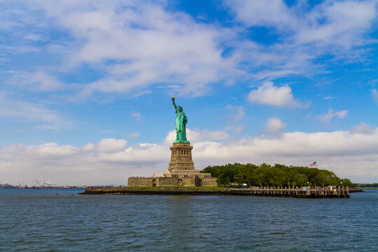 A wide angle image of the Statue of Liberty and the Liberty Island taken from the ferry 