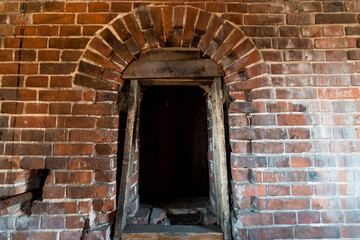 doorway with red brick arch