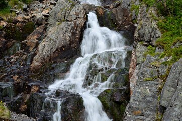 majestic summer mountain waterfall in northern Norway