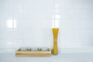 Modern white kitchen interior background with counter, Decoration top surface ceramic tile counter, Empty Copy space for text. for use mockup product display.