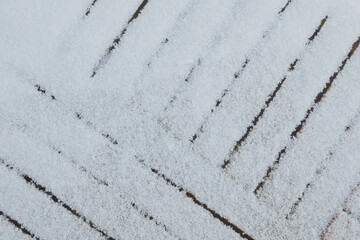 Obraz premium snow on the wall. Wooden floor board covered with snow. Garden in winter. 