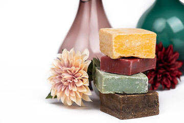variety of Handmade colored soap with flower spa on a white background