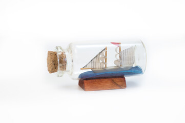 suyenir with a boat bottle