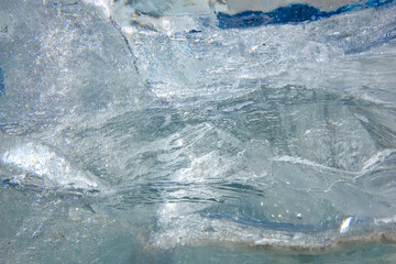 Waves, patterns, air, frozen water in nature. Abstract ice drawing.