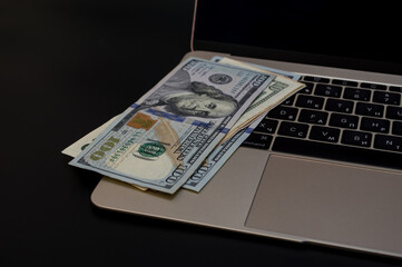 laptop with money