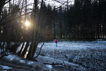 A sunday on the frozen local lake and river in Oslo, Bogstadvannet.  Norwegian families are out in the cold skating on the frozen river and lake. Not much snow, but really cold. 
