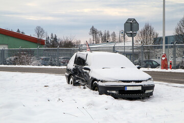 Abandoned car in the ditch after the traffic accident. The driver didn´t give way to another car....