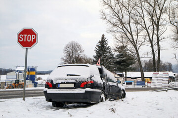 Abandoned car in the ditch after the traffic accident. The driver didn´t give way to another car....