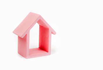 Residential Property idea with small pink house on white background.