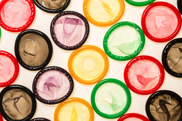 Colorful condoms background.