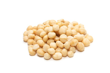 Macadamia nuts isolated on white background.