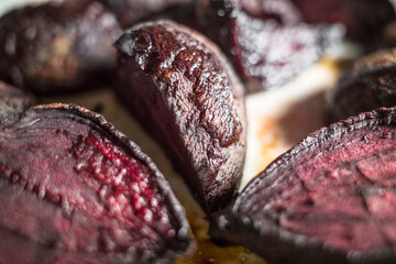 Roasted red beets on a baking tray