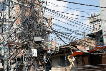 Utility pole with lots of entangled wires, Kathmandu, Nepal