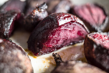 Roasted red beets on a baking tray