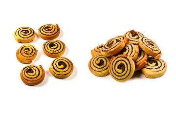 Baked cookies with raisins and poppy seeds isolated on white background.