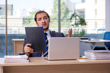 Young businessman employee working in the office