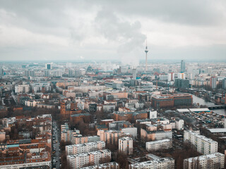 Aerial drone shot of Kreuzberg, Berlin with the famous TV Tower of Berlin in the back