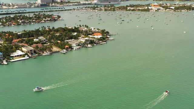 Miami aerial flyover boats and homes 4k