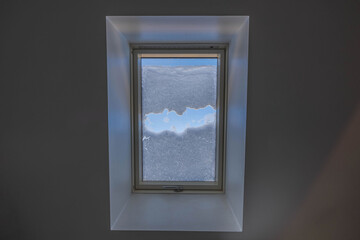 Close up view of close sunroof window isolated with view of winter background.