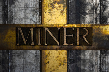 Miner text on textured grunge copper and vintage gold background