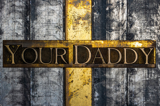Your Daddy text on grunge textured copper and gold background