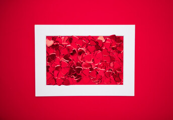 Creative layout made of hearts. Flat lay. Love concept.Red background.