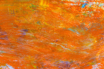 colorful creative motley background: smudged residues of oil paints on a wooden palette, short...