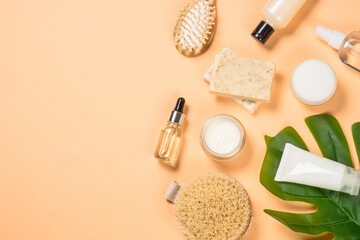 Spa and wellness products at trendy beige background. Flat lay image with copy space.