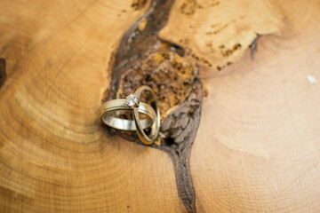 engagement rings on wood