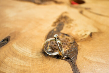 engagement rings on wood