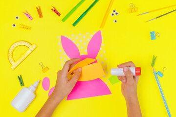 DIY and kids creativity. Step by step instruction: Create an Easter card with bunny and carrot. Childrens handmade Easter craft.