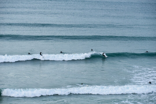 Winter surf St Ives Bay Hayle Cornwall Surfers