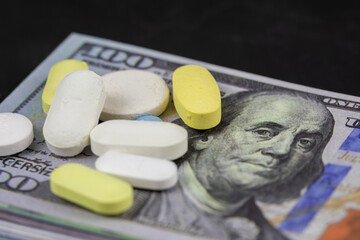 Money and pill, pharmacy concept