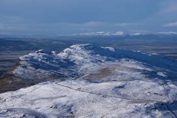 Fototapeta na wymiar panoramic view of snow covered Ochil Hills 