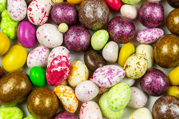 Colorful lollipops and colorful round candies. Top view. Close-up