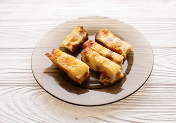 Cottage cheese casserole with raisins filling.