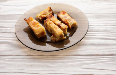 Cottage cheese casserole with raisins filling.