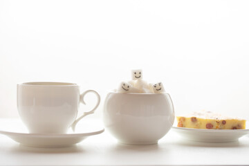 Homemade biscuits and a cup of tea on the table in the morning.