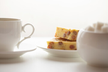 Homemade biscuits and a cup of tea on the table in the morning.